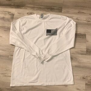 Gildan men’s long sleeved white shirt size large with a black flag on it